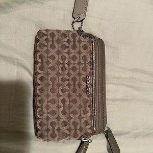 Coach Wallet lanyard not included. Used like new.